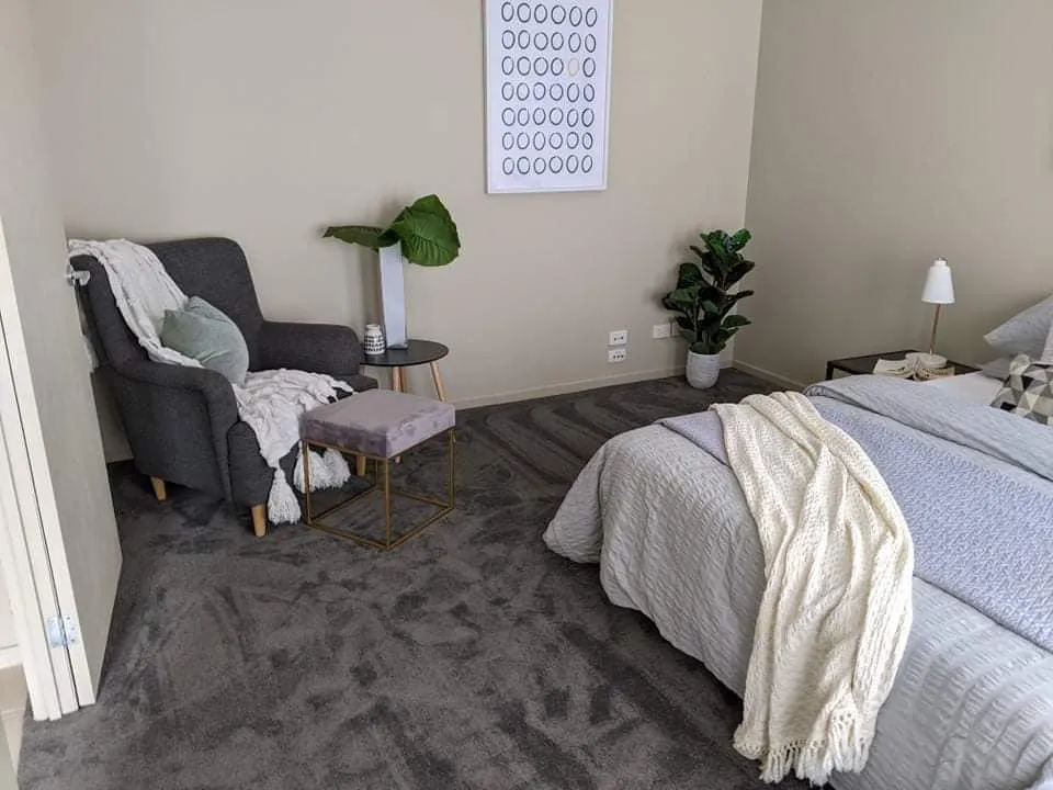 Soft grey carpet laid in a bedroom