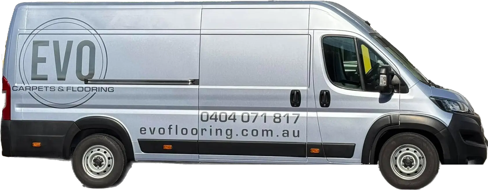 The silver Evo Carpets & Flooring mobile showroom van, signwritten with the logo, phone number and website
