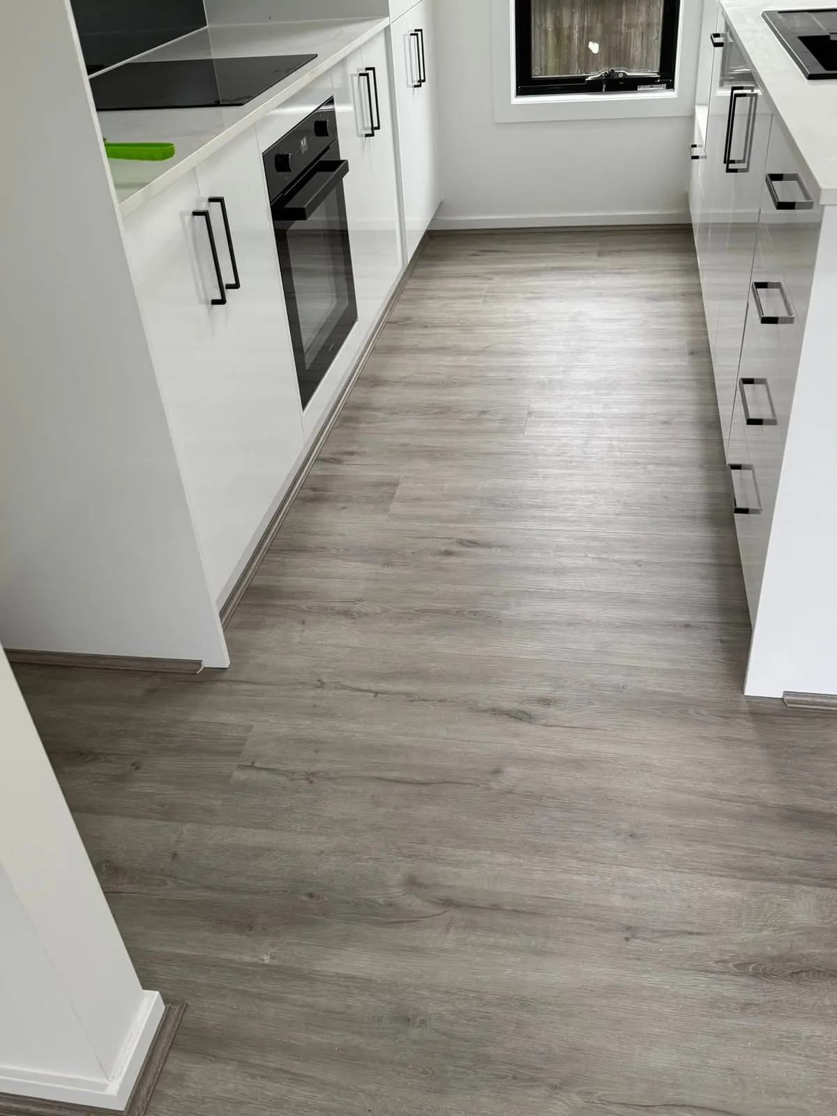 Hybrid flooring through a new kitchen