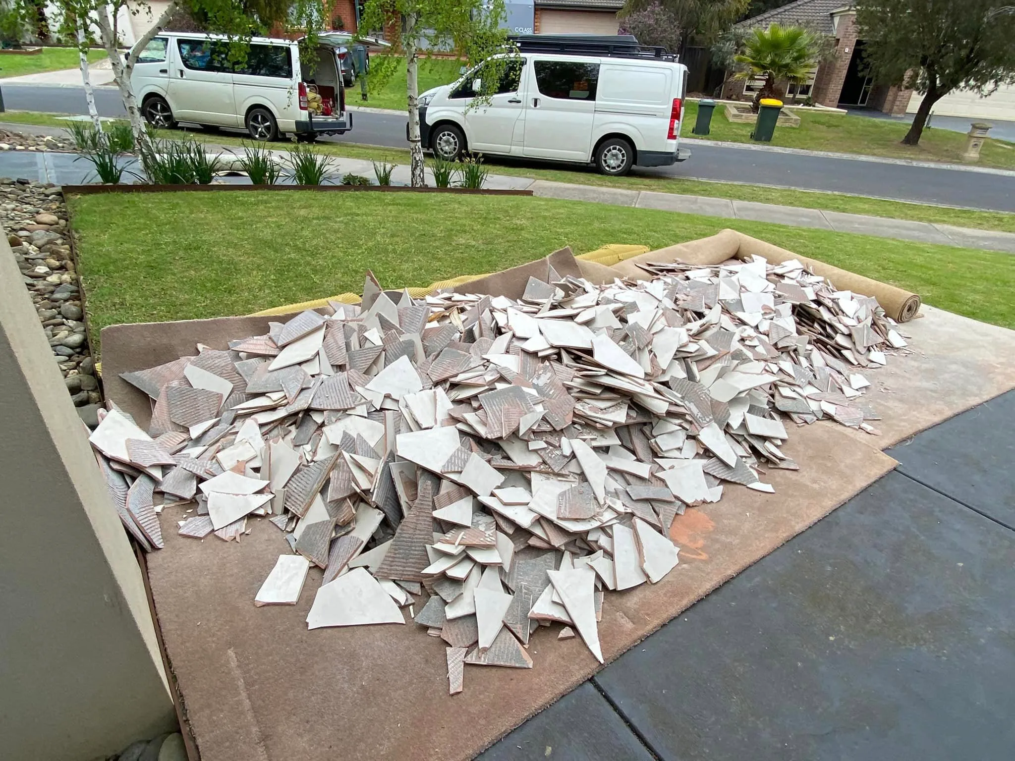 Pile of old floor tiles removed from a home
